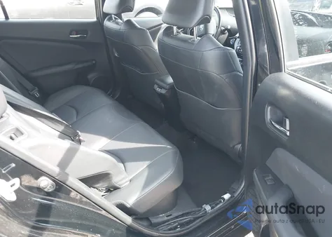 2021 Toyota Prius Xle z USA, uszkodzony, nr VIN JTDKAMFU8M3136565